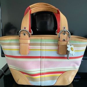 Small fabric with leather trim coach bag